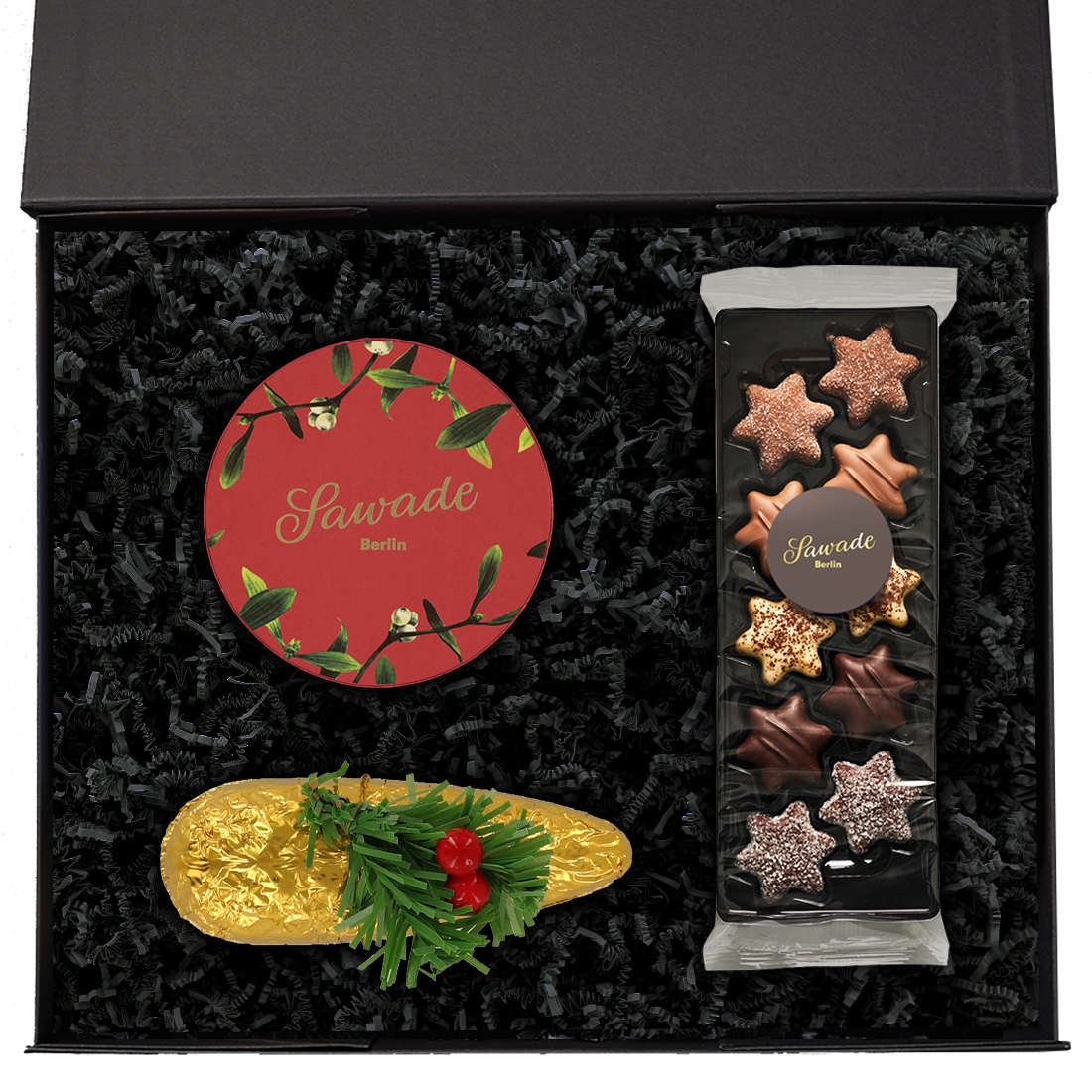 Produktbild: Geschenkeset in geöffneter Schachtel mit weihnachtlichen Spezialitäten