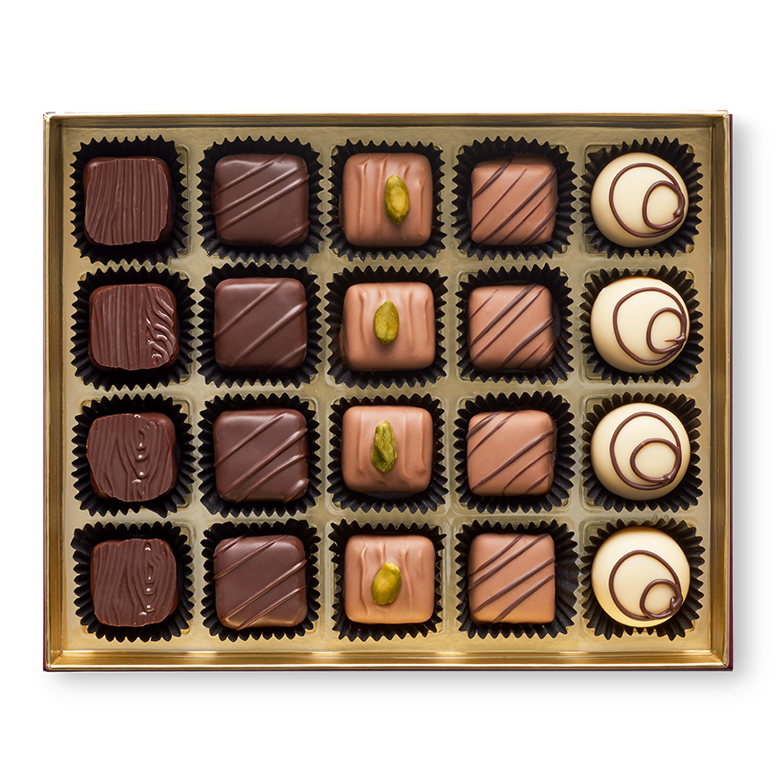 Große Pralinenschachtel Musikanten offen mit Pralinen