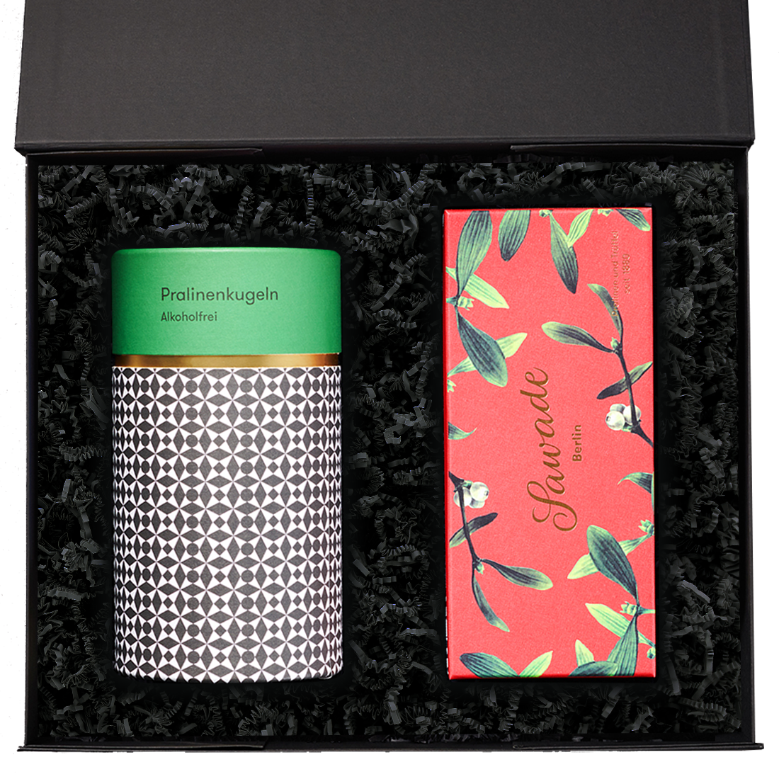 Produktbild: Geschenkeset in geöffneter Schachtel mit Geschenkdose mit alkoholfreien Pralinenkugeln und klassischer Schachtel mit Mistelzweig-Motiv